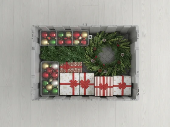 A crate packed with holiday decorations