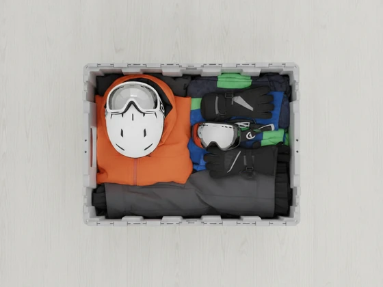 A crate packed with ski kit